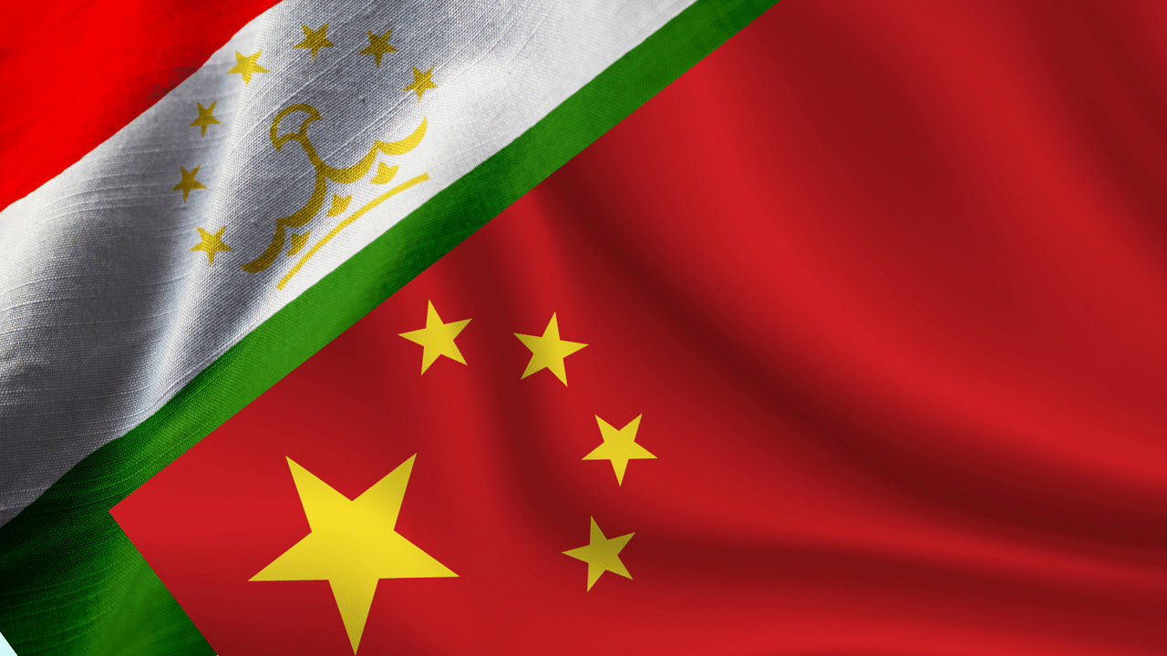 <div class="paragraphs"><p>Flags of Tajikistan and China.</p></div>